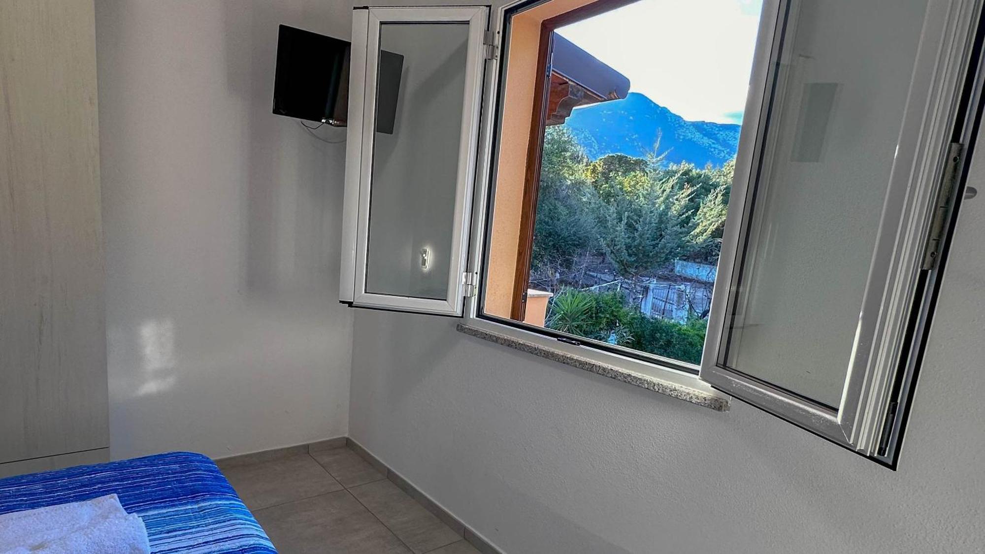 Mama House Con Vista Mare Apartment Кала Гононе Екстериор снимка